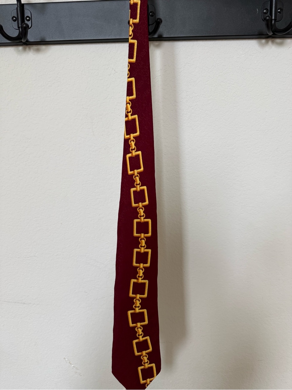 Dolce & Gabbana Burgundy Tie with Gold Square Chain Motif